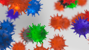 A imagem de vírus de cores diferentes em um fundo local o conceito de microbiologia e doença